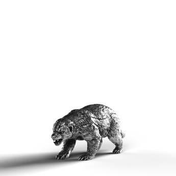 Silver statue of a honey badger in 999 fine silver.
