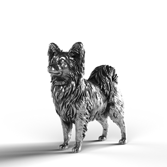 Silver statue of a Papillon dog made from 999 fine silver.
